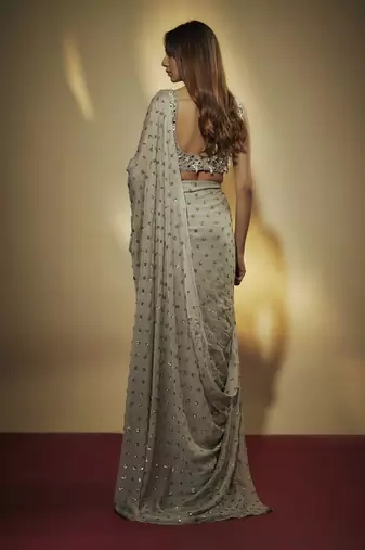 Steel grey sequins and mirror embroidered draped skirt set.