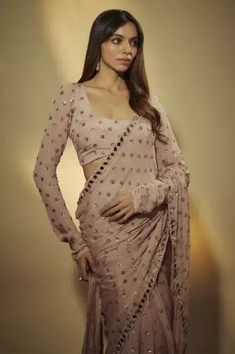 Mauve chinnon chiffon sequins pre drapped saree with mirror lace along with sequins full sleevs blouse
