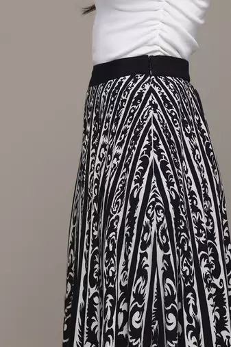 Black arabesq printed pleated skirt by label ritu kumar