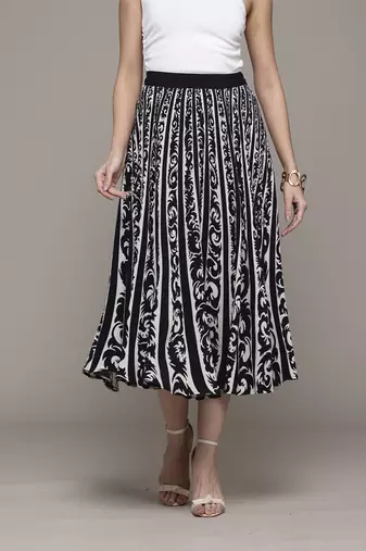 Black arabesq printed pleated skirt by label ritu kumar