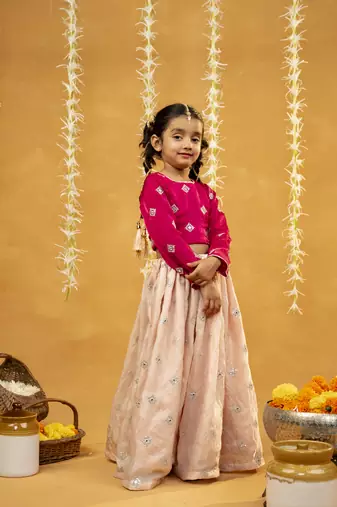  pink embroidered top with peach lehenga