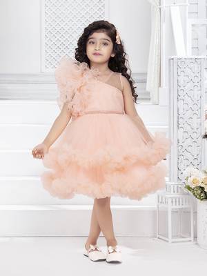 peach solid net double layer frilled glitter embellish frock 1
