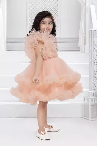 peach solid net double layer frilled glitter embellish frock