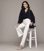 Black arabesq solid top by label ritu kumar