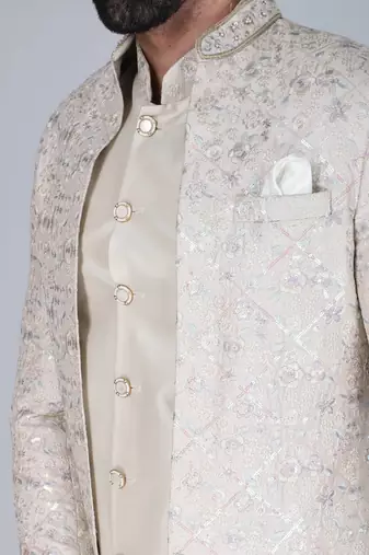 Off white thread and sequins embroidered short indowestern on silk