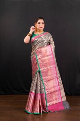 Banarasi kora organza saree in grey  with white gold woven motifs and contrasting border 1