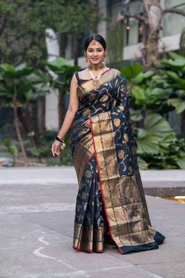 Black banarasi art silk blend saree with golden floral motifs 1