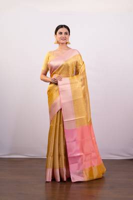 Gold tissue art silk saree with detailed pink zari border 2