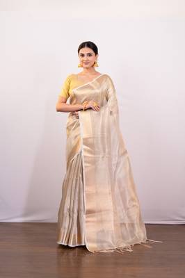 Golden beige tissue art silk saree with golden border 1