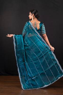 Teal blue jimmy choo saree with intricate silver embellishments and blouse 3
