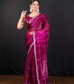 Magenta jimmy choo saree with intricate silver embellishments and ready blouse