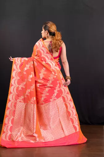 Pink dual toned  banarasi katan silk blend saree with silver zari necklace border and floral motifs
