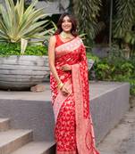 Red pure banarasi katan silk saree with silver zari jaal motifs  and border