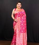 Pink pure banarasi katan silk saree with silver zari jaal motifs  and border