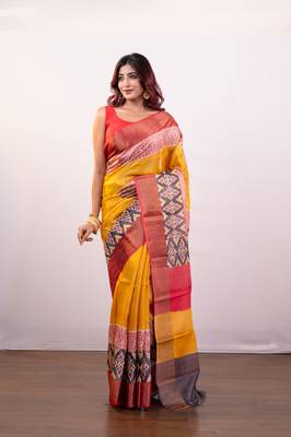 Yellow handpainted  tussar silk saree with red alpana design and multi pallu 1