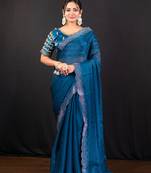 Blue jimmy choo saree with intricate silver embellishments and beautiful curve border