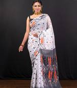 Offwhite cotton jamdani saree with black and rust woven booti
