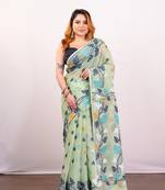 Mint green cotton jamdani saree with  multi leaf motifs