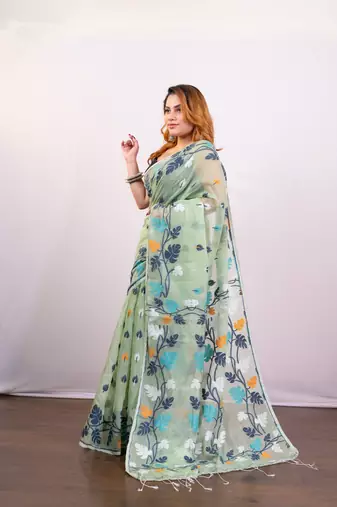 Mint green cotton jamdani saree with  multi leaf motifs