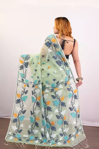 Mint green cotton jamdani saree with  multi leaf motifs