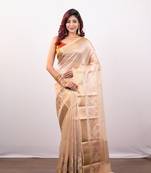 Beige organza art silk saree with golden zari floral border