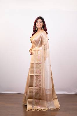Beige organza art silk saree with golden zari floral border 2