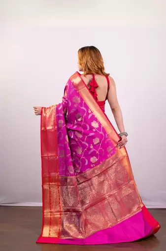 Pink banarasi art silk blend saree with golden floral motifs