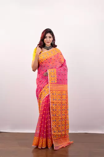 Pink cotton jamdani saree with multi booti and yellow woven border pallu