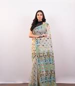 Beige cotton jamdani saree with multi woven booti