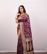 Wine pure banarasi katan silk saree with golden floral jaal motifs and golden border pallu