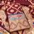 Maroon soft banarasi silk zari woven design dress material