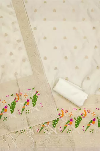 White soft banarasi silk zari woven design dress material