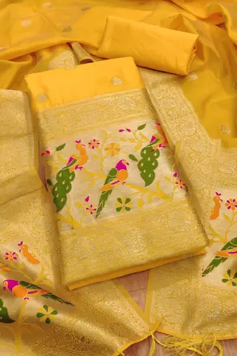Yellow soft banarasi silk zari woven design dress material