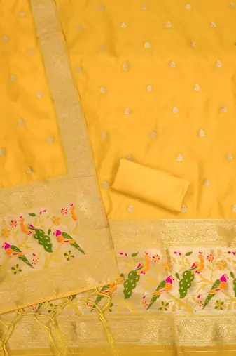 Yellow soft banarasi silk zari woven design dress material