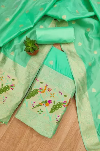 Seagreen soft banarasi silk zari woven design dress material