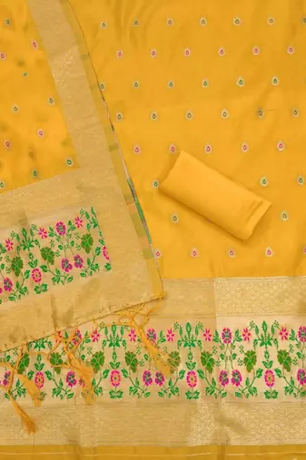 Yellow soft banarasi silk zari woven design dress material