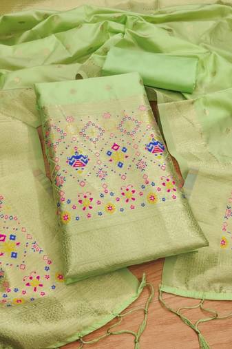 Pista soft banarasi silk zari woven design dress material