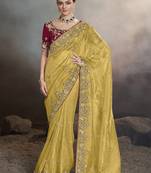 Yellow zari-sequins work fancy fabric saree with designer blouse