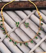 Elegant emerald gold necklace and earrings set, traditional indian jewellery with green stones