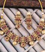Traditional gold-plated necklace and earrings set with red stones, antique design, wedding jewellery