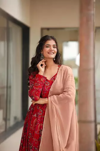 Maroon partywear printed gown for trendy looks