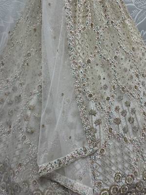 off white zircon work net lehenga set choli with dupatta with dupatta 4
