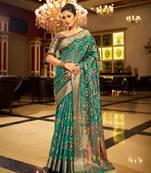 Firozi Organza Silk Blend Zari Border Festive Wear Saree With Blouse Piece