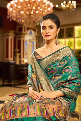 Firozi Organza Silk Blend Zari Border Festive Wear Saree With Blouse Piece