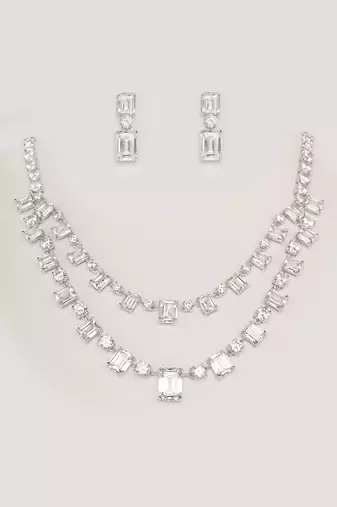 Delicate yet elegant diamond necklace in white finish with matching earrings