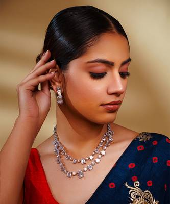 Delicate yet elegant diamond necklace in white finish with matching earrings 3