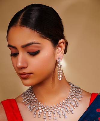 Delicate yet elegant diamond necklace in white finish with matching earrings 1