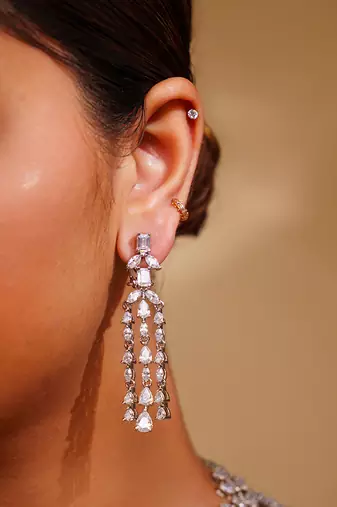 Delicate yet elegant diamond necklace in white finish with matching earrings