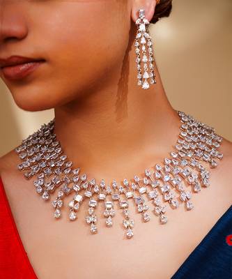 Delicate yet elegant diamond necklace in white finish with matching earrings 3