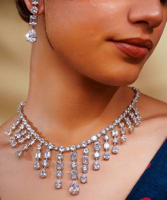 Delicate yet elegant diamond necklace in white finish with matching earrings 4